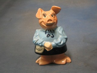 A Wade piggy bank in the form of a girl pig