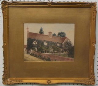 A 20th Century coloured photograph "Country Cottage with Figures" 7" x 9" in a gilt frame