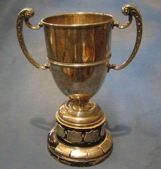 A Victorian silver twin handled trophy cup "The London and Southwest Railways Swimming Challenge Cup" London 1861, 18 ozs