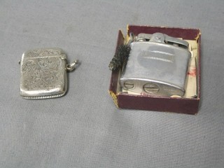 An engraved silver cigarette case and a Ronson lighter