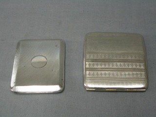 A silver cigarette case Birmingham 1925 with engine turned decoration and a silver plated ditto
