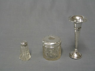 An Edwardian circular cut glass hair tidy, Birmingham 1910, a small cut glass salt bottle with silver lid and a cut glass specimen vase