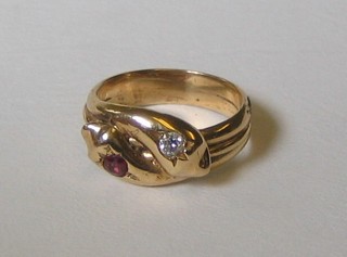A gold dress ring in the form of 2 entwined serpents, the eyes set a ruby and a diamond