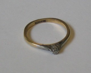A lady's 18ct gold solitaire dress ring