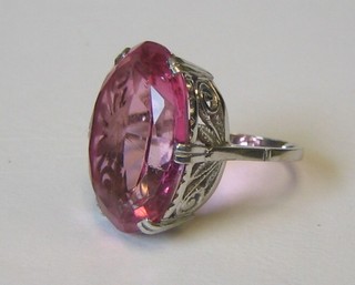A lady's 18ct white gold and platinum dress ring set a large oval pink cut stone