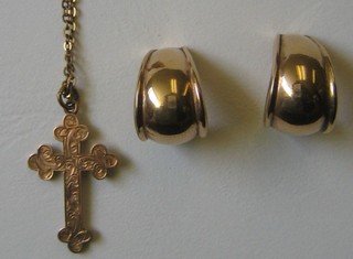 A 9ct gold cross hung on a fine gold chain, a gilt metal chain and a pair of "gold" hoop earrings