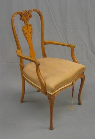 A walnut Queen Anne style carver chair with carved splat back and upholstered seat, on cabriole supports
