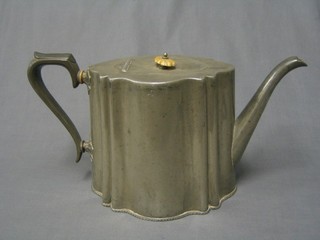 A large Britannia metal teapot