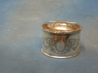 An Edwardian oval engraved silver plated tea caddy with hinged lid 5"