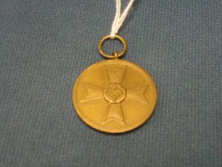 A Nazi period German War Merit medal