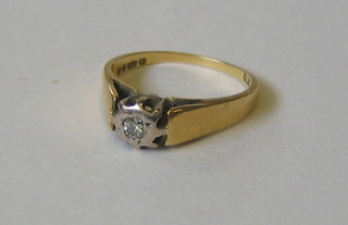 A lady's 18ct yellow gold illusion set diamond solitaire engagement/dress ring