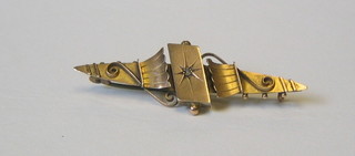 An Edwardian 9ct gold bar brooch