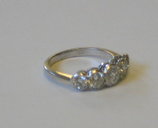 A lady's handsome 18ct white gold engagement/dress ring set 5 diamonds (approx 1.53ct)