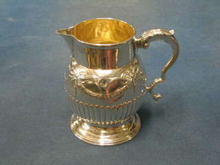 A Victorian oval engraved Britannia metal teapot