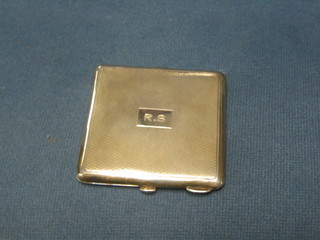An Art Deco silver compact with engine turned decoration Birmingham 1938