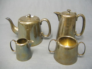 A 4 piece silver plated hotelware tea service comprising teapot, hotwater jug, twin handled sugar bowl and cream jug