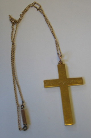 An 18ct gold cross hung a fine gold chain