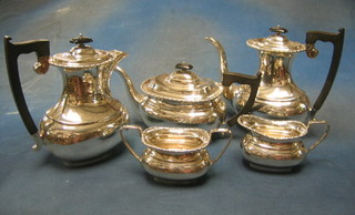 A Georgian style silver 5 piece tea/coffee service comprising teapot, coffee pot, hotwater jug, twin handled sugar bowl and cream jug, Sheffield 1962, 63 ozs