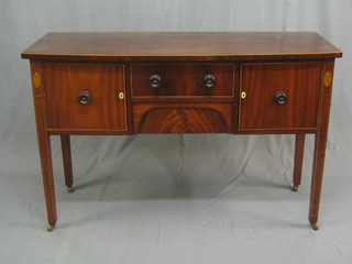 A 19th Century inlaid and crossbanded mahogany bow front sideboard, fitted 1 long drawer flanked by a pair of cupboards on square tapering supports 55"