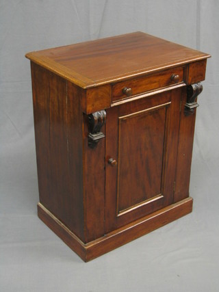 A 19th Century rectangular mahogany enclosed washstand with hinged lid, the base fitted a cupboard raised on a platform base 24"