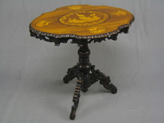 An Austrian shaped and inlaid mahogany pedestal table, the top inlaid figures of animals in a rocky landscape, raised on a carved turned column and tripod supports 29"