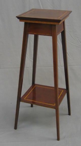 An Edwardian inlaid mahogany 2 tier jardiniere stand raised on square tapering supports 12"