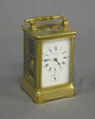 A handsome 19th Century French 8 day repeating and striking carriage alarm clock by Le Roy and Files 13-15 Palais-Royal Paris, with white porcelain dial (slight crack to the corner), contained in a gilt metal case