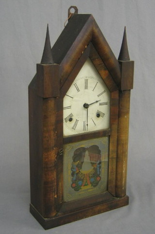 A 19th Century 8 day American shelf clock with painted dial contained in a mahogany Cathedral style case