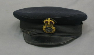 A WWII Royal Navy Chief Petty Officer's cap together with  a photograph of a ship entering Malta harbour and 1 other photograph
