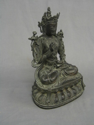 A bronze figure of a seated Buddha 12"