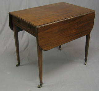 A 19th Century mahogany Pembroke table fitted a drawer and raised on square tapering supports ending in brass caps and castors 30"