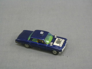 A Corgi Super 88 Man From Uncle Car together with a figure