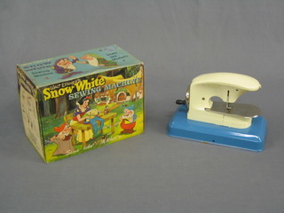 A Walt Disney Snow White sewing machine, boxed