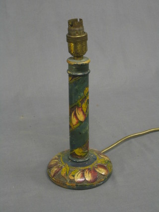 A 1930's carved wooden table lamp with fruit decoration