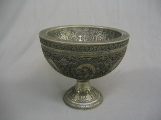 A large Eastern engraved metal urn with liner, raised on a circular spreading foot 16"