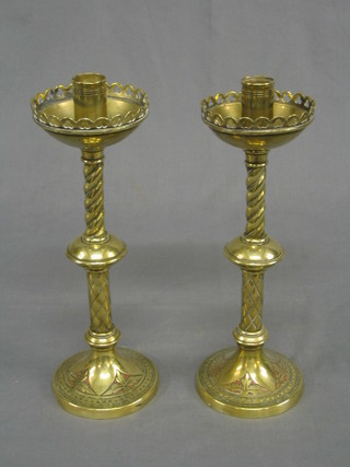 A pair of Victorian brass candlesticks 11"