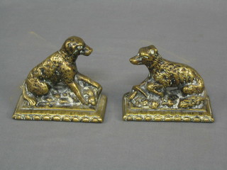 A pair of 19th Century brass book ends in the form of seated dogs 5 1/2"