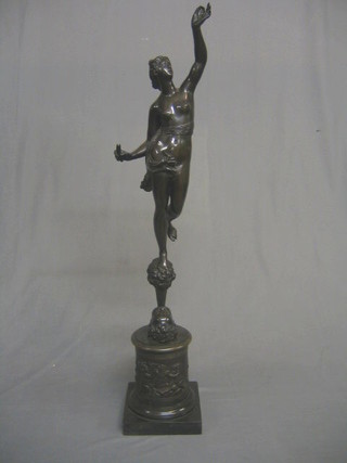 A 19th Century bronze figure of a standing naked classical lady, raised on a circular base, embossed figures of Industry and Education, raised on a square black marble base 32" (slight chip to marble base)