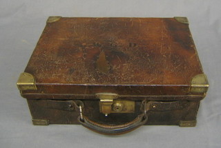 A 19th Century leather cartridge magazine with brass banding 15"