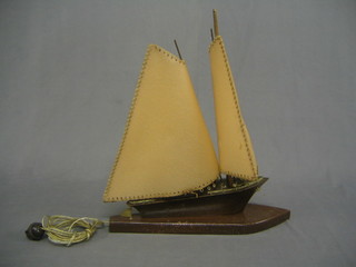 A wooden table lamp in the form of a 2 masted yacht 17"