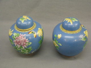 A large pair of 20th Century cloisonne enamel blue ground and floral patterned ginger jar and cover 11"