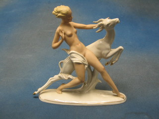 An Art Deco Hummel Continental porcelain figure of a standing naked lady with leaping deer 9"