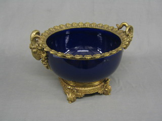 A large reproduction 19th Century Coalport blue porcelain planter with gilt metal mounts, the twin handles in the form of rams heads 15"