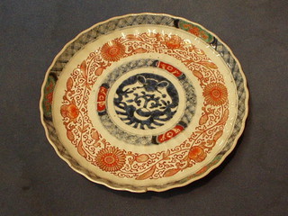 A 19th Century circular Japanese Imari porcelain plate 8" (chip to rim)