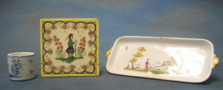 A rectangular faience twin handled pen tray decorated figures 9", do. egg cup and tile