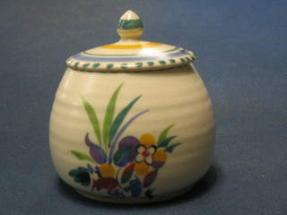 A circular Poole Pottery preserve jar and cover, the base impressed Poole and incised 288, 3"