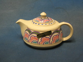 A circular Honiton pottery teapot, base marked Honiton Devon D7G172