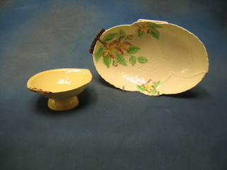 A Carltonware leaf shaped bowl with floral decoration, base impressed Carltonware Australian designed 16652, 11" together with a hearth shaped bowl, base marked Australian pattern 6"