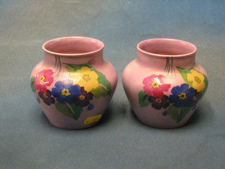 A pair of Carltonware purple glazed vases with floral decoration 4"