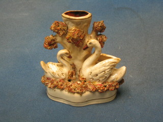 A 19th Century Staffordshire spill vase in the form of 2 swans